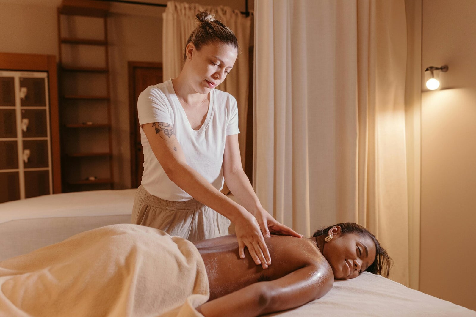 A relaxing professional massage in a warm, peaceful setting